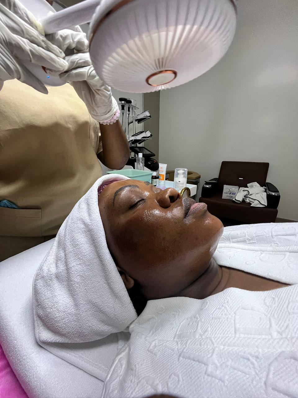 Facial skin assessed under a magnifying lamp